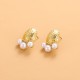 Goose egg oval hammer patterned pearl steel earrings