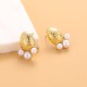Goose egg oval hammer patterned pearl steel earrings