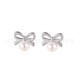 Bow shaped pearl stainless steel earrings