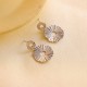 Round sunflower stainless steel earrings