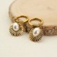 Fan shaped hollow sun shaped pearl stainless steel earrings