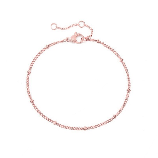 Stainless steel bracelet with laminated clip beads