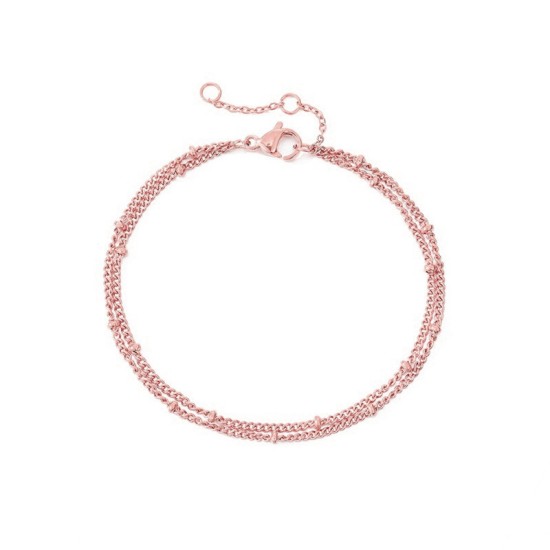 Stainless steel bracelet with laminated clip beads