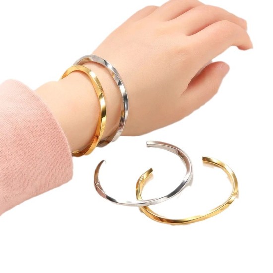 Twisted opening C-shaped stainless steel bracelet